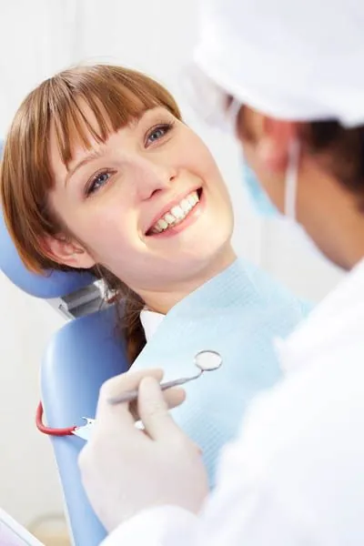 patient and dentist during a dental checkup