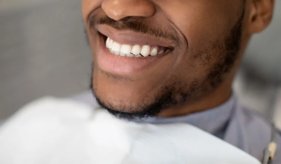 closeup of a patient's smile while visiting Garland dental office Comfort Dental Meadowbrook